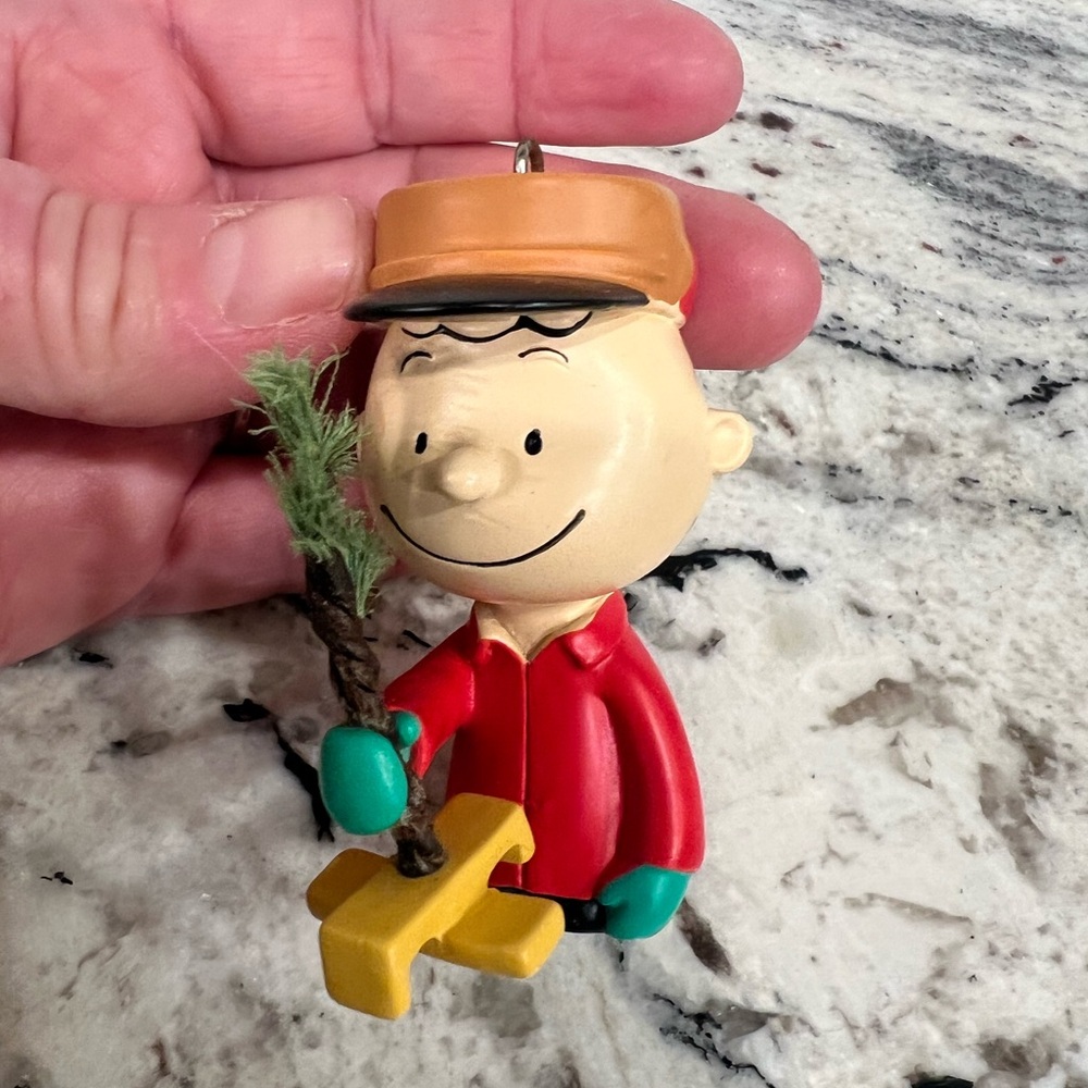 Hallmark Peanuts Charlie Brown Kneeling with Tree ornament